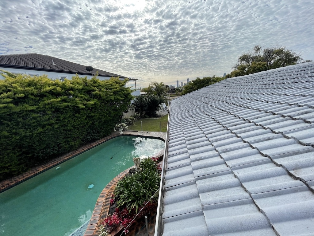 Photo of a roof with a pool cleaned by professional gutter cleaning service